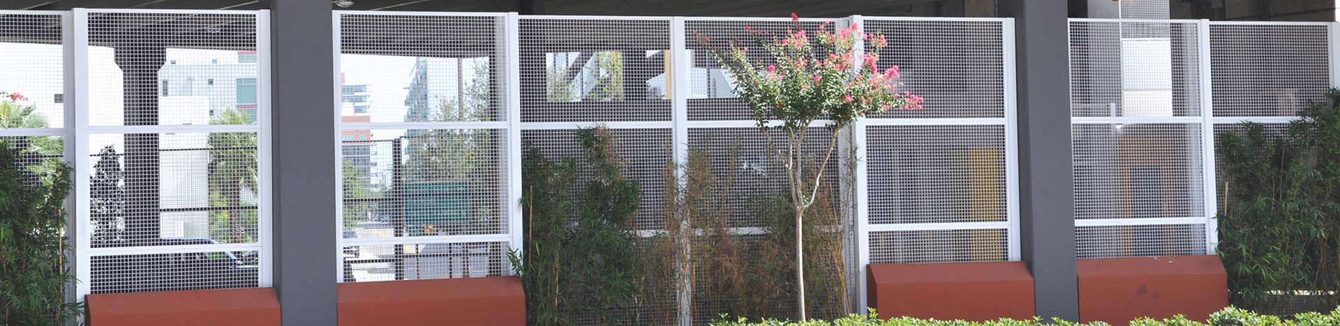 Direct Metals Wire Mesh Paneling Used on the Outside of a Parking Garage